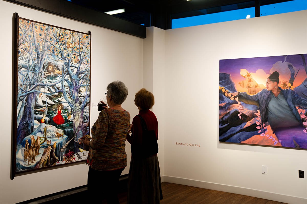 exhibitions-page-3.0 Two women looking at an art piece together