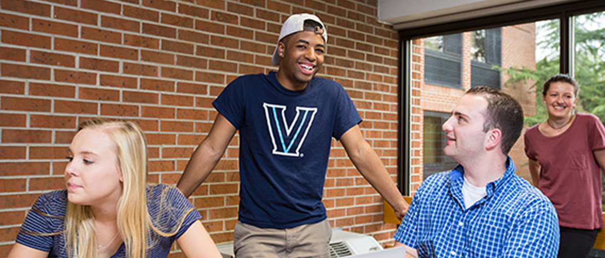 Students gathering in jovial discussion