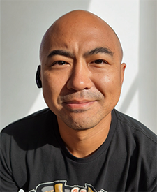 An image of illustrator Rich Lee.