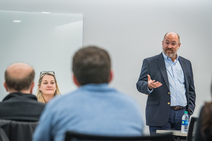 Matt Carluzzo teaching a course within the paralegal program