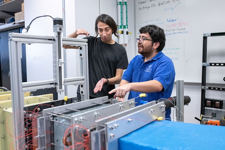 Student and professor in lab