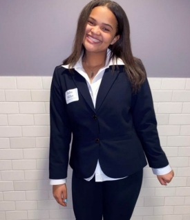 India Miller c Female student in dark suit