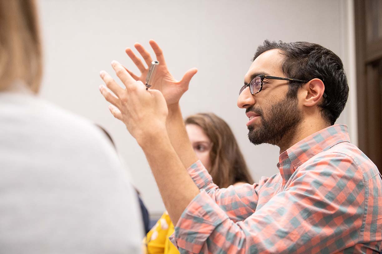 Male student speaking in class