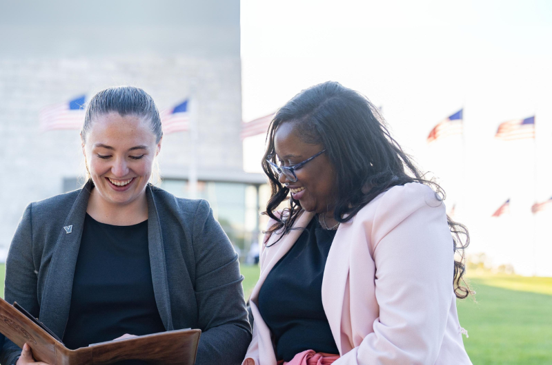 two women outside of the National Monument