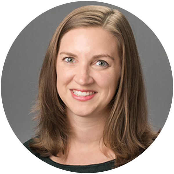 Headshot of Kelly Good smiling directly at the camera. 